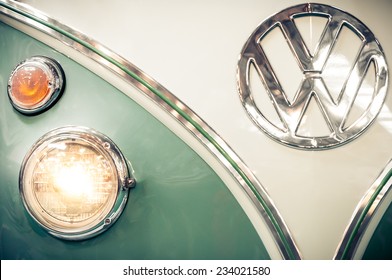 Moscow, Russia - March 3, 2013: Front view of a green and white 1960s VW campervan with the iconic volkswagen badge.