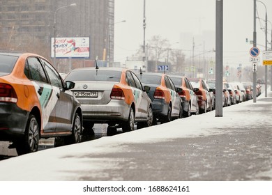 Moscow, Russia - March 31, 2020: An Empty Street In Levoberezhniy District With A Lot Of Unused Car Sharing Delimobil On It With The Covid Pandemic Happening.