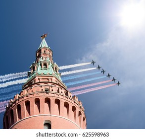 MOSCOW, RUSSIA - MAY, 07 2015: Russian Military Aircrafts Fly In Formation Over Moscow Kremlin  During Victory Day Parade, Russia