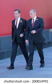 MOSCOW, RUSSIA - MAY 09, 2014: Celebration Of The 69th Anniversary Of The Victory Day (WWII) On Red Square. President Vladimir Putin And Prime Minister Dmitry Medvedev Came To The Ceremony