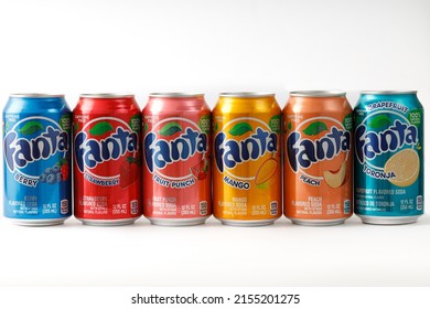 Moscow, Russia, May 10, 2022: Tin Cans Of Soda Sparkling Drink Of Different Flavors In Stock. Fanta Berry, Strawberry, Punch, Mango, Peach, Toronja By Coca-Cola Company