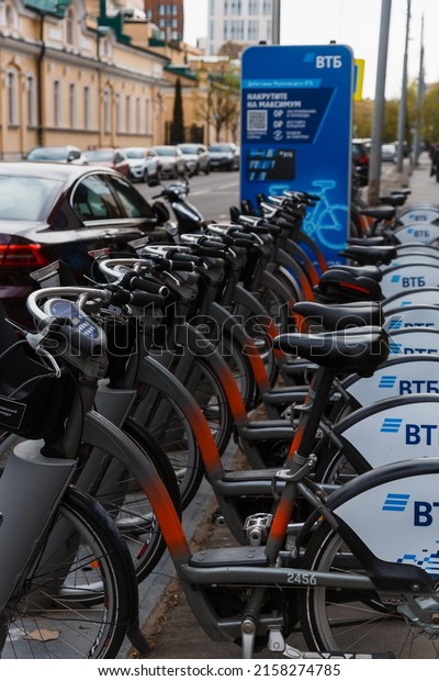 Moscow, Russia - May,\
11, 2022. Bike rental on the street in the city center, focus on\
the steering wheel