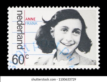 MOSCOW, RUSSIA - MAY 13, 2018: A Stamp Printed In Netherlands Shows Family Portrait Of Anne Frank, Occupation And Liberation Serie, Circa 1980