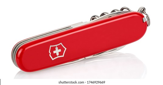 Moscow, Russia - May 15, 2020: View of closed red Victorinox classical swiss pocket foldable knife isolated on white background with reflection on glossy surface