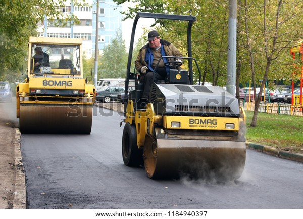 MOSCOW, RUSSIA -\
MAY , 2011:Two yellow rink for asphalt. The program of renovation\
of public areas in\
Moscow.