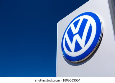 Moscow, Russia - May, 2018: Volkswagen VW automobile dealership Sign against blue sky. VW is a German automaker founded on 28 May 1937.