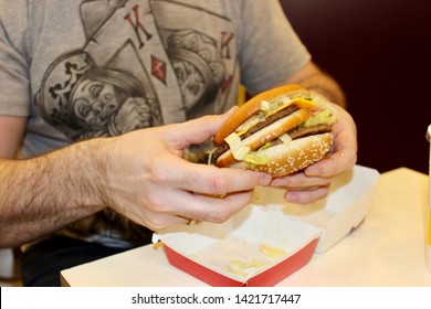 Moscow, Russia, May 2019. Man Eating Hamburger. McDonald’s. Hamburger Big Mac