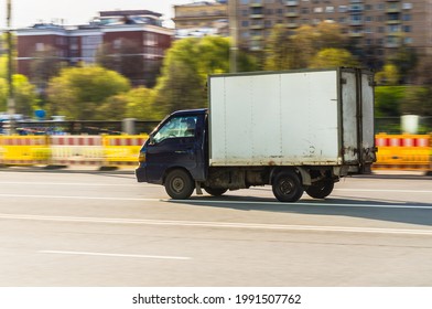 Moscow , Russia - May 2021: Old Cargo Van Hyundai Porter In The City Street. Fast Moving Box Van On The Road