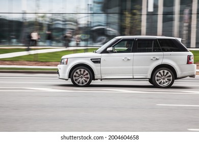 Moscow, Russia - May, 2021: White SUV Car Range Rover Sport First Generation At The City Driveway. Auto Moving At High Speed On The Street