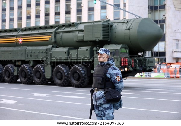 Moscow, Russia - May 2022: Nuclear weapon,\
soldier of russian military forces standing on background of\
strategic missile system \