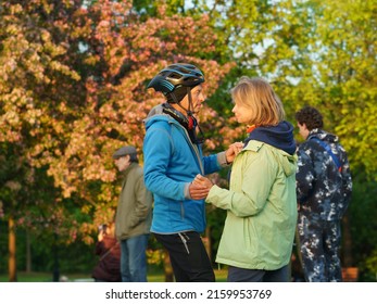 Moscow, Russia - May 21, 2022: Cheerful Dancing Couple Of Middle Aged Man And Woman In Public Park. Lifestyle Theme. Having Fun People. Bright Photography