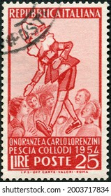 MOSCOW, RUSSIA - MAY 25, 2021: A Stamp Printed In Italy Shows Pinocchio And Group Of Children, Carlo Lorenzini Collodi, 1954