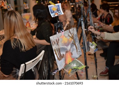 Moscow, Russia - May 26, 2022: Acrylic Or Oil Painting Landscape On A Black Metal Easel On A Painters Background At Art Studio.

Drawing Lesson, Hobby, Creation Or Art Class Concept.