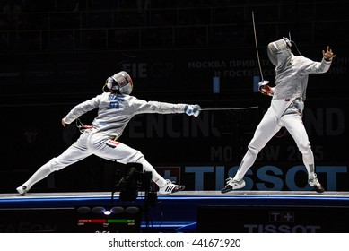 Moscow, Russia - May 30, 2015: Unidentified professional fencers in the finals of the men's individual event at the 2015 Moscow Sabre international fencing tournament.
