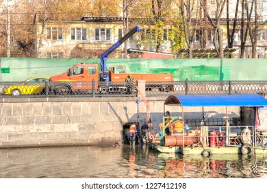 MOSCOW, RUSSIA - November 07.2018: Workers Repair Stormwater Runoff In The Vodootvodny Canal