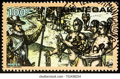 Moscow, Russia - November 10, 2017: A Stamp Printed In Senegal Shows Meeting Christopher Columbus With Haitian Natives, Series 