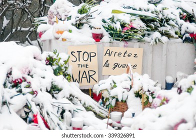 MOSCOW, RUSSIA - NOVEMBER 15, 2015:  In front of France Embassy in Moscow, flowers and candles from Russian citizens for victims of terrorist attack in Paris - Shutterstock ID 339326891
