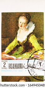 MOSCOW, RUSSIA - NOVEMBER 16, 2019: Postage Stamp Printed In Ras Al Khaimah UAE Shows Reading Young Woman; By Jean Honore Fragonard (1732-1806), Mother's Day: Paintings Serie, Circa 1968