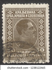 MOSCOW, RUSSIA - NOVEMBER, 2018: A Post Stamp Printed In YUGOSLAVIA Shows King Alexander I Of Yugoslavia, Circa 1924 - 1932