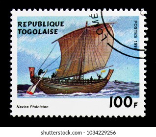 MOSCOW, RUSSIA - NOVEMBER 26, 2017: A Stamp Printed In Togo Shows Phoenician Boat, Sailing Ships Serie, Circa 1999