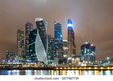Moscow, Russia, November 30 2020, Moscow international business center (Moscow city), night photography with long exposure, selective focusing, glare of night lights high-rise buildings made of glass - Shutterstock ID 1877487739