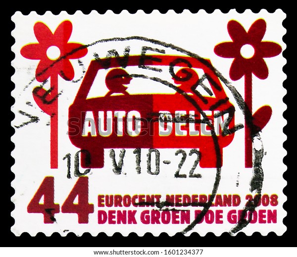 MOSCOW, RUSSIA - NOVEMBER 4, 2019: Postage stamp\
printed in Netherlands shows Car Sharing, Think Green, Do Green\
serie, circa 2008