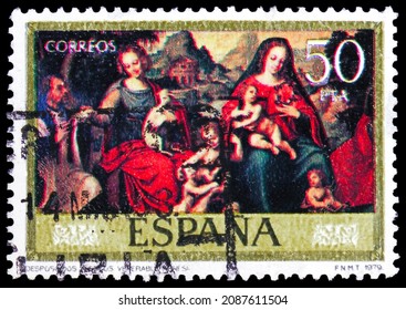 MOSCOW, RUSSIA - NOVEMBER 7, 2021: Postage stamp printed in Spain shows "Adoration of the Mystic Lamb", Juan de Juanes, Painters serie, circa 1979