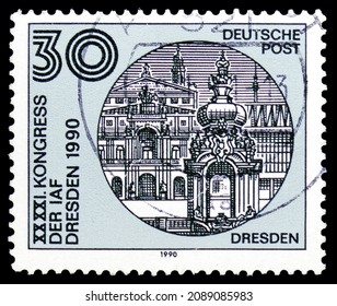 MOSCOW, RUSSIA - NOVEMBER 8, 2021: Postage Stamp Printed In Germany Shows Buildings In Dresden, Congress Of The International Astronautical Federation (IAF) Serie, Circa 1990