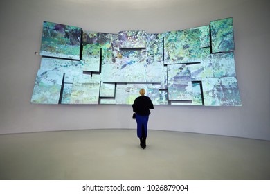 MOSCOW, RUSSIA - OCT 28, 2017: Woman (MR) Stands In Front Of The Breathing Canvas - Permanent Installation In Museum Of Russian Impressionism In Moscow Created By American Artist Jean Christophe.