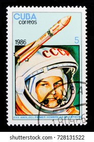 MOSCOW, RUSSIA - OCTOBER 1, 2017: A stamp printed in Cuba shows Valentina Tereshkova and Vostok 6, 25th Anniv of First Man in Space serie, circa 1986