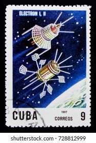 MOSCOW, RUSSIA - OCTOBER 1, 2017: A stamp printed in Cuba shows Electron 1 and 2, 10th Ann. Of The Launch Of The First Artificial Satellite serie, circa 1967