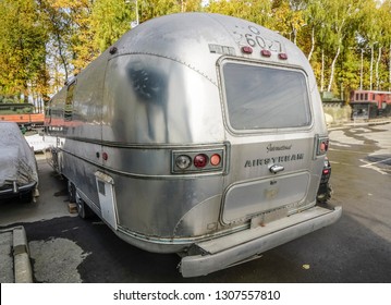 MOSCOW, RUSSIA -  October 13, 2018: luxury American Airstream caravan parked on gravel on a campsite. 