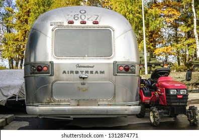 MOSCOW, RUSSIA - October 13, 2018: luxury American Airstream caravan parked on gravel on a campsite.