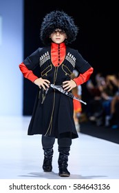 MOSCOW, RUSSIA - OCTOBER 19, 2016: Model Walk Runway For WORLD RUSSIAN BEAUTY Catwalk At Spring-summer 2017 Moscow Fashion Week. Clothes In National Ethnic Style.