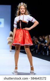 MOSCOW, RUSSIA - OCTOBER 19, 2016: Model Walk Runway For WORLD RUSSIAN BEAUTY Catwalk At Spring-summer 2017 Moscow Fashion Week. Clothes In National Ethnic Style.