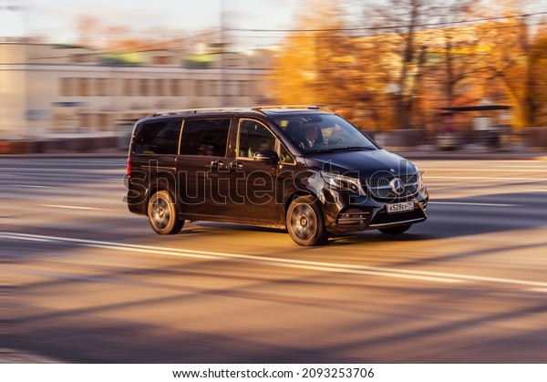 Moscow, Russia -\
October 2021: Mercedes-Benz Vito Tourer 119 CDI in motion on the\
city road on high speed. Black light commercial vehicle is driving\
on the highway, front side\
view
