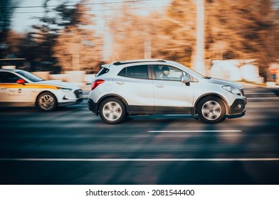 Moscow, Russia - October 2021: SUV Car In Motion. Silver Opel Mokka Model Is Driving On City Highway, Side View.