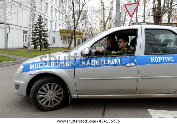 MOSCOW, RUSSIA - OCTOBER 24,2013:Learning to drive a car\
in the cadet corps of the police.Cadet corps - initial military\
training school with the full Board to prepare youth for a military\
career. 