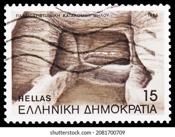 MOSCOW, RUSSIA - OCTOBER 25, 2021: Postage Stamp Printed In Greece Shows View Of A Catacomb Niche, Catacombs Of Mylos Serie, Circa 1985