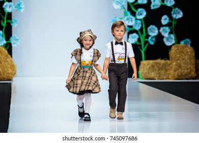 MOSCOW, RUSSIA - OCTOBER 28, 2017: Model Walk Runway For LANA2ROCK By ASUTINA JULIA For KIDS Catwalk At Spring-Summer 2018 Season Moscow Fashion Week. Kid's Fashion.