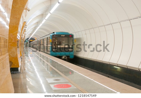 MOSCOW, RUSSIA - OCTOBER 28, 2018: Departing\
subway train from the station\
Okruzhnaya