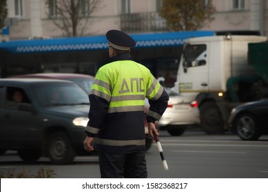 MOSCOW / RUSSIA - OKTOBER 29, 2019: Traffic Police Inspector Stands By The Road