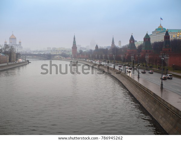 Moscow,\
Russia, panorama of Kremlin in rainy, foggy\
day