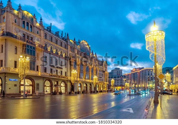 Moscow. Russia. Road in winter Moscow.\
Christmas illumination on buildings. Road in the evening capital.\
Cars drive through Moscow at night. Capital of Russia is decorated\
for Christmas.\
09.01.2020