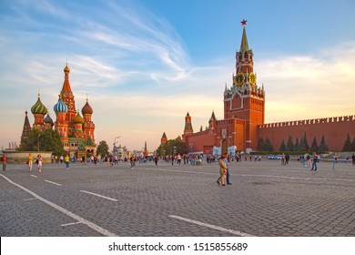 Moscow Russia - Sept 2019: Famous Red Square with a view of Kremlin, the Kremlin wall, St. Basil's Cathedral, Place of execution. People walk along the main square of Moscow and Russia in sunny day