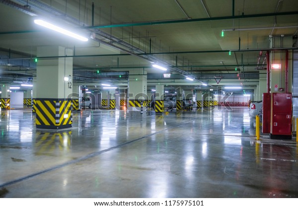 Moscow, Russia - September, 10, 2018: cars\
on a underground parking in Moscow,\
Russia