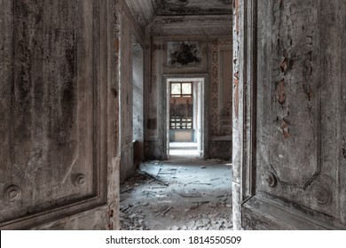 Moscow, Russia - September 12 2020: Abandoned Mansion Interior. Half Open Grunge Doors. Old Palace Enfilade. Spooky Haunted House Concept.