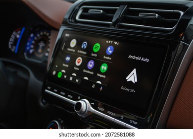 MOSCOW, RUSSIA - SEPTEMBER 15, 2021 Android Auto on the screen. Homescreen. Modern car. Interior close up. Car media close up view. Homescreen.