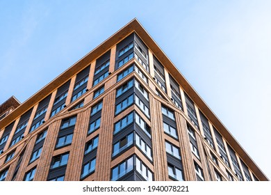 Moscow, Russia - September 2 , 2020: Business Class Residential Complex Tsarskaya Ploshad. New Modern Residential Buildings Made Of Red And Yellow Brick Against The Blue Sky. 