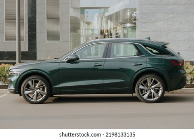 Moscow, Russia - September 2022: Genesis GV70 SUV Car Parked On A City Street, Side View